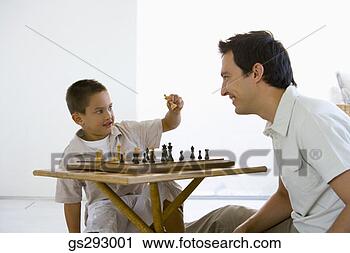 Stock Photography - father and son 
playing chess. 
fotosearch - search 
stock photos, 
pictures, images, 
and photo clipart