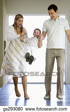 Stock Photography - playful parents 
swinging son. 
fotosearch - search 
stock photos, 
pictures, images, 
and photo clipart
