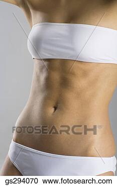 Stock Photography - stomach of woman 
in underwear. 
fotosearch - search 
stock photos, 
pictures, images, 
and photo clipart