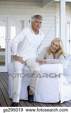Stock Photograph - couple on couch. 
fotosearch - search 
stock photos, 
pictures, images, 
and photo clipart