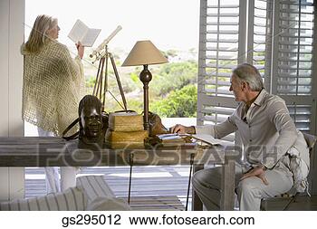 Stock Photo - couple relaxing 
indoor. fotosearch 
- search stock 
photos, pictures, 
images, and photo 
clipart