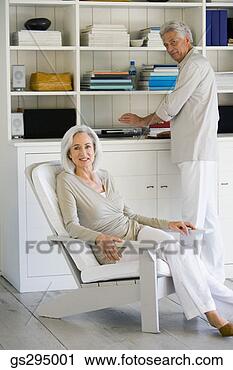 Stock Photography - couple relaxing. 
fotosearch - search 
stock photos, 
pictures, images, 
and photo clipart
