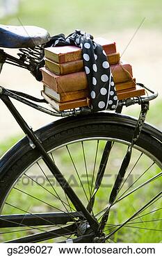 Picture - books on bike. 
fotosearch - search 
stock photos, 
pictures, images, 
and photo clipart