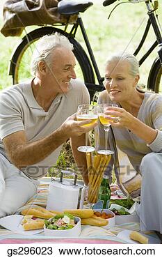 Stock Photo - couple having 
picnic. fotosearch 
- search stock 
photos, pictures, 
images, and photo 
clipart