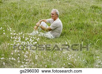 Stock Photography - man in field. 
fotosearch - search 
stock photos, 
pictures, images, 
and photo clipart