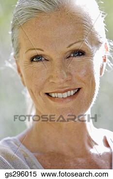 Stock Image - portrait of smiling 
woman. fotosearch 
- search stock 
photos, pictures, 
images, and photo 
clipart