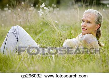 Stock Photo - woman in field. 
fotosearch - search 
stock photos, 
pictures, images, 
and photo clipart