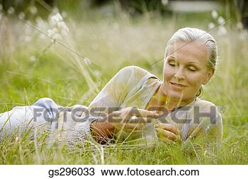 Stock Photo - woman in field. 
fotosearch - search 
stock photos, 
pictures, images, 
and photo clipart