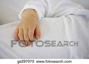 Stock Photo - baby's hand. fotosearch 
- search stock 
photos, pictures, 
images, and photo 
clipart