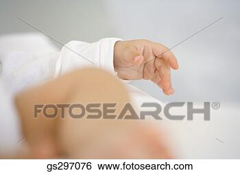 Stock Photo - baby's hand. fotosearch 
- search stock 
photos, pictures, 
images, and photo 
clipart