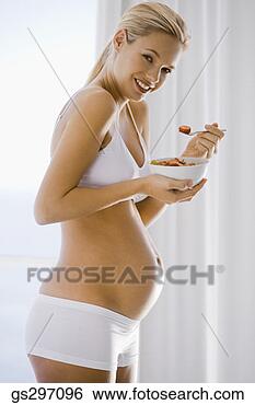Stock Photo - pregnant woman 
with bowl of fruit. 
fotosearch - search 
stock photos, 
pictures, images, 
and photo clipart