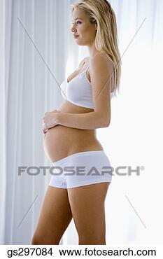 Stock Photo - pregnant woman 
in underwear. 
fotosearch - search 
stock photos, 
pictures, images, 
and photo clipart