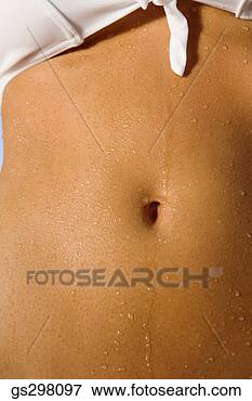 Picture - close-up of wet 
stomach. fotosearch 
- search stock 
photos, pictures, 
images, and photo 
clipart