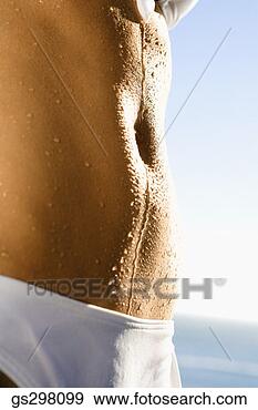 Stock Photograph - close-up of wet 
stomach. fotosearch 
- search stock 
photos, pictures, 
images, and photo 
clipart