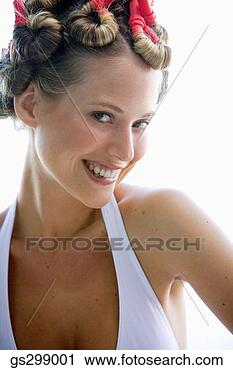 Stock Photography - smiling woman 
wearing curlers. 
fotosearch - search 
stock photos, 
pictures, images, 
and photo clipart