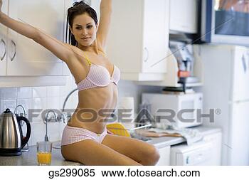 Stock Image - woman in lingerie 
stretching. fotosearch 
- search stock 
photos, pictures, 
images, and photo 
clipart
