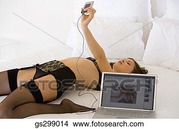 Stock Photo - woman recording 
herself on webcam. 
fotosearch - search 
stock photos, 
pictures, images, 
and photo clipart