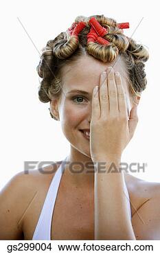 Stock Photo - woman wearing 
curlers covering 
her face. fotosearch 
- search stock 
photos, pictures, 
images, and photo 
clipart