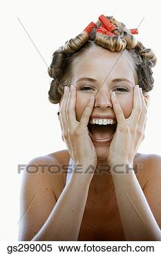 Stock Image - woman wearing 
curlers with hands 
on face. fotosearch 
- search stock 
photos, pictures, 
images, and photo 
clipart