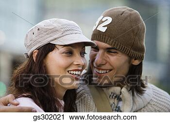 Stock Photography - couple talking 
outdoors. fotosearch 
- search stock 
photos, pictures, 
images, and photo 
clipart