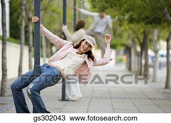 Stock Photo - playful woman. 
fotosearch - search 
stock photos, 
pictures, images, 
and photo clipart