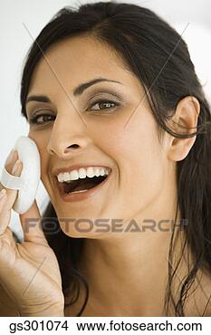 Stock Photo - woman applying 
makeup. fotosearch 
- search stock 
photos, pictures, 
images, and photo 
clipart