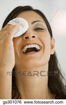 Stock Photo - woman applying 
makeup. fotosearch 
- search stock 
photos, pictures, 
images, and photo 
clipart