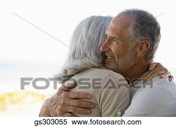 Stock Image - couple hugging. 
fotosearch - search 
stock photos, 
pictures, images, 
and photo clipart