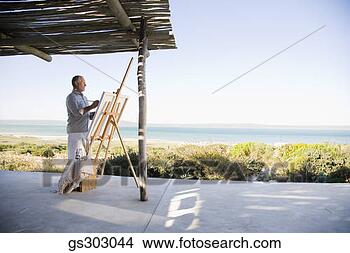Stock Photo - painter outdoors 
with easel and 
supplies. fotosearch 
- search stock 
photos, pictures, 
images, and photo 
clipart