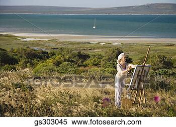 Stock Image - painter outdoors 
with easel and 
supplies. fotosearch 
- search stock 
photos, pictures, 
images, and photo 
clipart