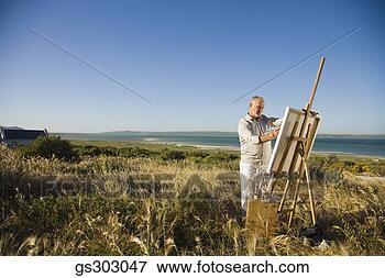 Picture - painter outdoors 
with easel and 
supplies. fotosearch 
- search stock 
photos, pictures, 
images, and photo 
clipart