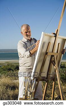 Stock Photo - painter outdoors 
with easel and 
supplies. fotosearch 
- search stock 
photos, pictures, 
images, and photo 
clipart
