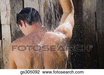 Stock Photo - back view of man 
showering outdoors. 
fotosearch - search 
stock photos, 
pictures, images, 
and photo clipart