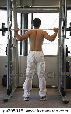 Stock Photo - man lifting barbell. 
fotosearch - search 
stock photos, 
pictures, images, 
and photo clipart