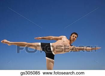 Stock Image - man doing yoga 
outdoors. fotosearch 
- search stock 
photos, pictures, 
images, and photo 
clipart
