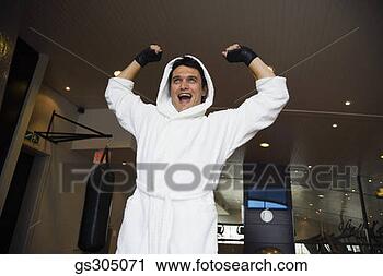 Stock Photography - pugilist cheering 
in robe. fotosearch 
- search stock 
photos, pictures, 
images, and photo 
clipart