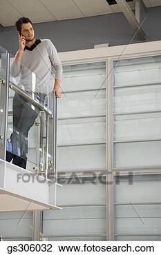 Stock Photo - businessman on 
cell phone. fotosearch 
- search stock 
photos, pictures, 
images, and photo 
clipart