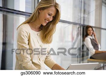 Stock Photography - businesswoman 
using laptop. 
fotosearch - search 
stock photos, 
pictures, images, 
and photo clipart