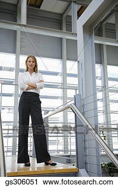 Stock Photography - confident businesswoman 
with arms crossed. 
fotosearch - search 
stock photos, 
pictures, images, 
and photo clipart
