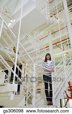 Stock Photo - serious businesswoman 
on stairway. fotosearch 
- search stock 
photos, pictures, 
images, and photo 
clipart