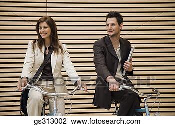 Stock Photo - businesspeople 
on bicycles. fotosearch 
- search stock 
photos, pictures, 
images, and photo 
clipart
