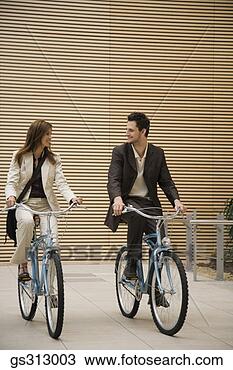 Stock Photo - businesspeople 
on bicycles. fotosearch 
- search stock 
photos, pictures, 
images, and photo 
clipart