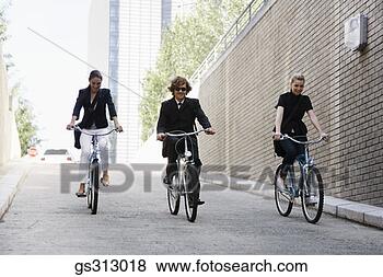 Stock Photo - businesspeople 
riding bicycles. 
fotosearch - search 
stock photos, 
pictures, images, 
and photo clipart