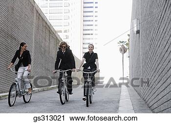 Stock Photography - businesspeople 
riding bicycles. 
fotosearch - search 
stock photos, 
pictures, images, 
and photo clipart