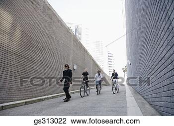 Stock Photo - businesspeople 
riding bicycles 
and skateboard. 
fotosearch - search 
stock photos, 
pictures, images, 
and photo clipart