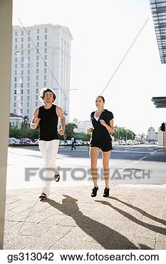 Stock Photo - couple jogging 
in city. fotosearch 
- search stock 
photos, pictures, 
images, and photo 
clipart