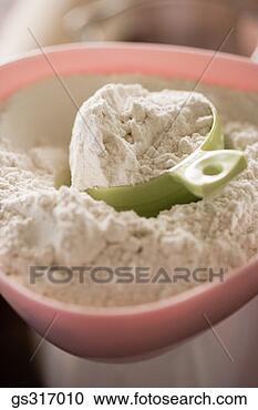 Arquivo de Fotografias - farinha,  medindo, 
 copo. fotosearch 
- busca de fotos, 
imagens e clipart