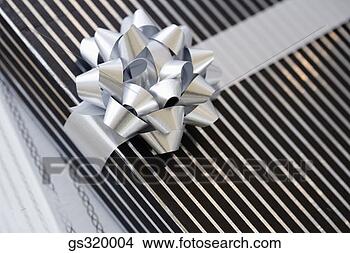 Stock Photo - bow on gift. fotosearch 
- search stock 
photos, pictures, 
images, and photo 
clipart
