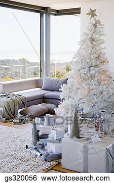 Stock Photo - contemporary christmas 
tree with gifts. 
fotosearch - search 
stock photos, 
pictures, images, 
and photo clipart