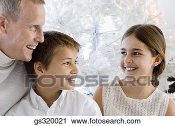 Stock Photography - father smiling 
with children. 
fotosearch - search 
stock photos, 
pictures, images, 
and photo clipart